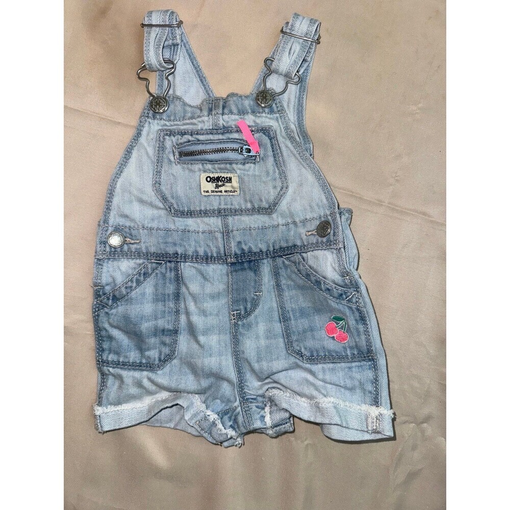 Oshkosh denim shortfalls with cherries on the pocket size 6-9 months